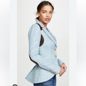 Smythe equestrian rifle patch tweed blazer.